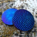 Haptic Coin Blue titanium alloy