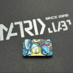 Matrix Badge 3D Naiko Titanium Alloy